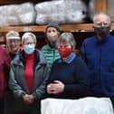 Helpers on hand to receive goods at Fresh Start’s new Tweed Mill premises.