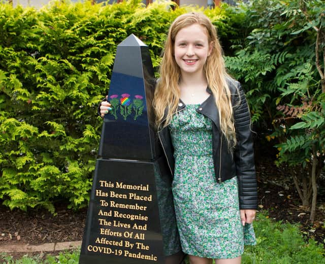 Poppy Lunn unveiled the memorial stone which is adorned by her artwork. (Photo: BILL McBURNIE)