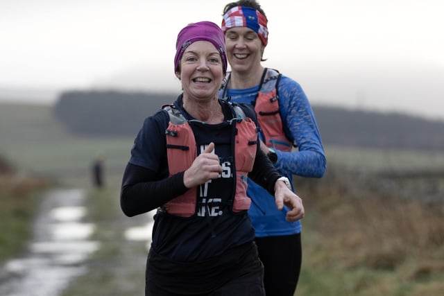 Two runners taking part in Lauderdale Limpers and Gala Harriers' social outing from Tweedbank to Lauder on Tuesday