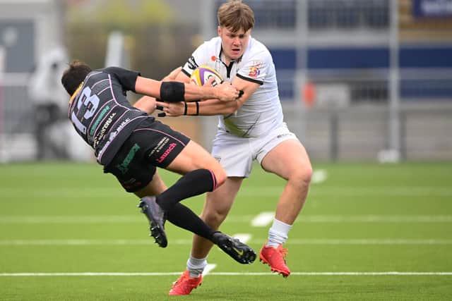 Southern Knights' Andrew Mitchell fending off a Robert Beattie challenge during yesterday's Fosroc Super6 final versus Ayrshire Bulls (Photo by Paul Devlin/SNS Group/SRU)