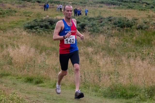 Moorfoot Runners' David Waldie finishes with one shoe