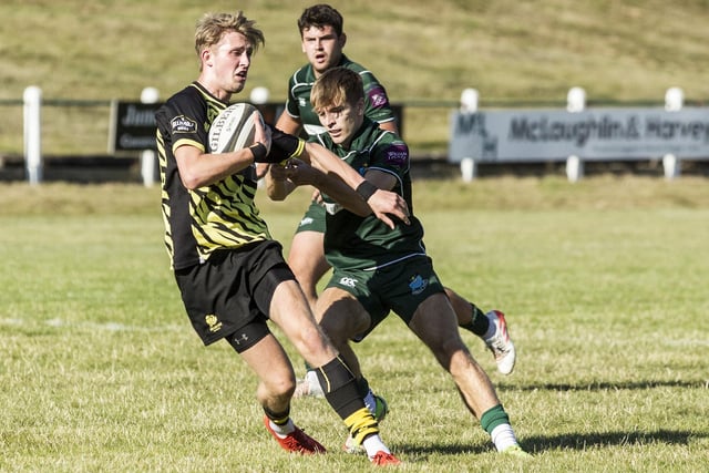 Hamish Weir on the ball for Melrose against their hosts at Hawick sevens