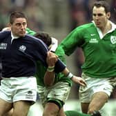 Alan Tait of Scotland is tackled by Dion O''Cuinneagain of Ireland during Scotland's 30-13 Five Nations win at Murrayfield on March 20, 1999 (Pic by Jamie McDonald/Getty Images)