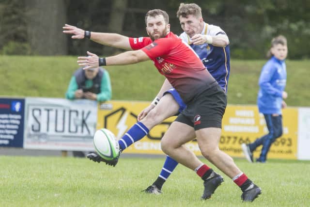 Jed-Forest full-back Lewis Walker clearing the ball against Glasgow Hawks at Riverside Park in Jedburgh at the weekend (Pic: Bill McBurnie)