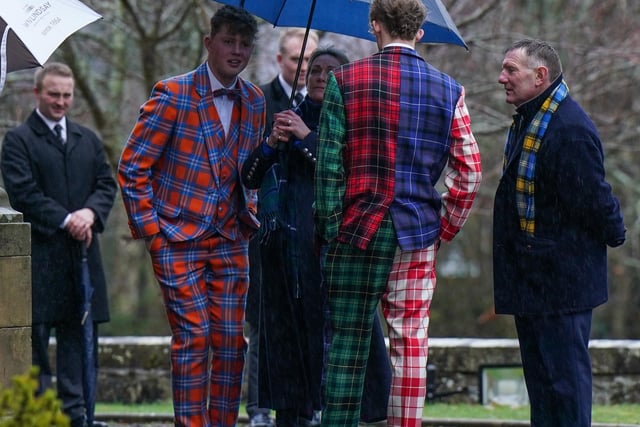 Jedburgh's Gary Armstrong, right, with two of Doddie Weir's sons at the ex-Scottish international lock's memorial service in Melrose on Monday