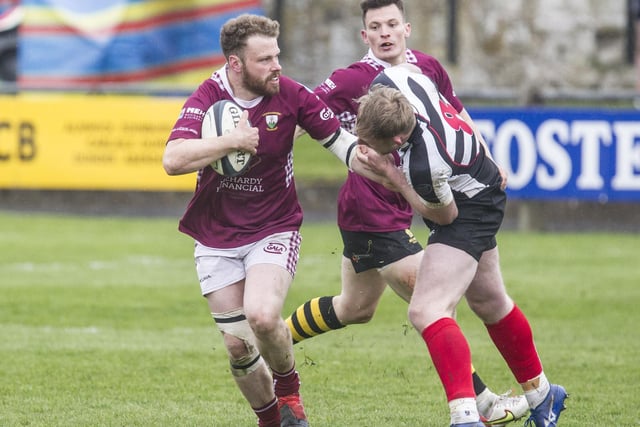 Rex Jeffrey on the ball for Gala against Kelso, supported by Struan Hutchison, on loan from Melrose