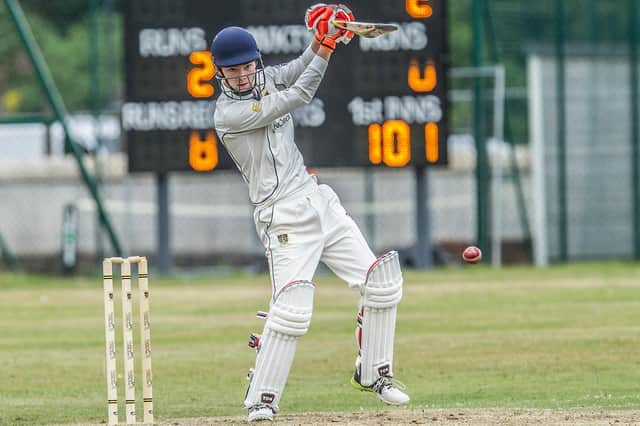 Justin Tait wields the bat for Hawick & Wilton (picture by Bill McBurnie)