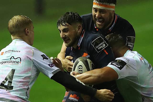 Charlie Shiel of Edinburgh being tackled by Tom Botha of Ospreys at Murrayfield on October 3, 2020. (Photo by Ian MacNicol/Getty Images)