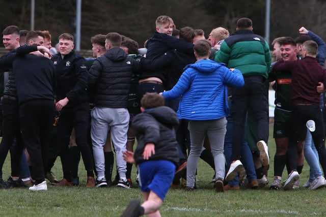 Hawick players celebrating with fans after beating Currie Chieftains on Saturday
