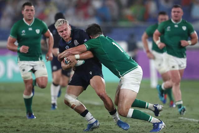 Scotland's Darcy Graham being tackled during their 2019 Rugby World Cup pool-A match against Ireland at the International Stadium Yokohama in Japan on September 22, 2019. (Photo by Behrouz Mehri/AFP via Getty Images)