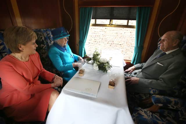 The Duke of Edinburgh accompanies the Queen and First Minister Nicola Sturgeon onboard the Union of South Africa train, on their way to Tweedbank in September 2015 to officially open the new Borders Railway.