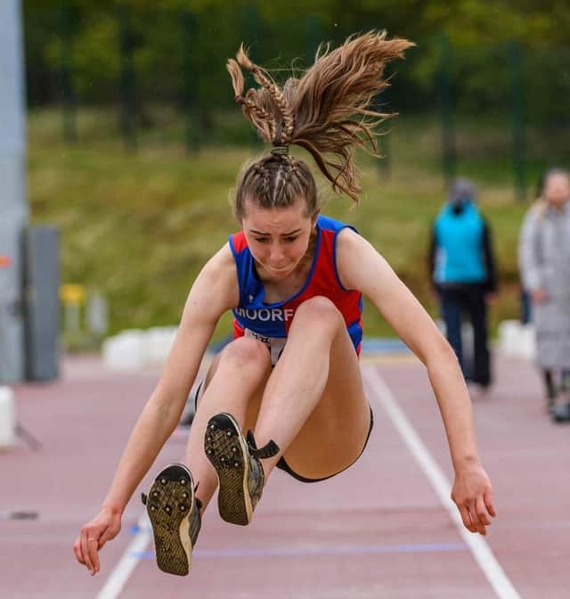Kate Harvie shows her prowess at the triple jump