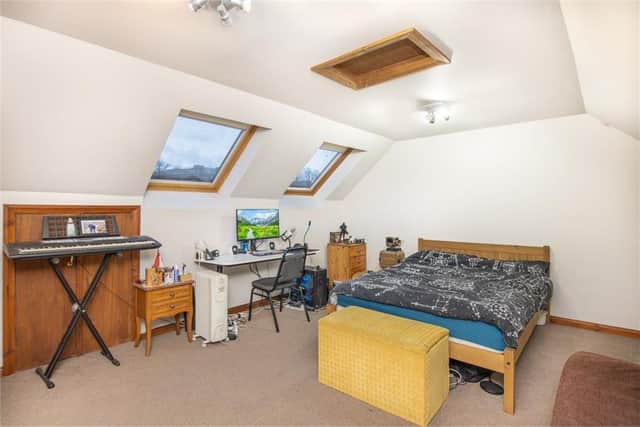 The fully converted attic provided ideal space for extended family or as a home office.