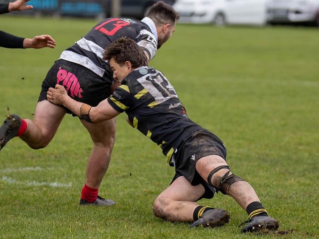 Gavin Wood making a tackle for Melrose, on Adam Hall, as they lost 39-22 away to Kelso at Poynder Park on Saturday (Photo: Andy McLean)