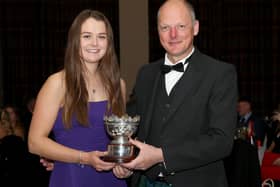 Katie Edgar being presented with her award by Bruce Edward in Cumbernauld (Photo: Jim Crichton)
