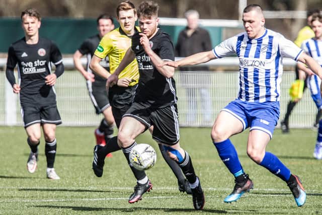 Gala Fairydean Rovers' Ciaren Chalmers vying for possession with Broomhill's Euan Griffiths (Photo: Bill McBurnie)