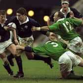 Scotland's Alan Tait getting past Ireland's Paul Wallace and Kurt McQuilkin during a 38-10 Five Nations victory for the hosts at Edinburgh's Murrayfield Stadium in March 1997 (Pic: Andrew Redington/Allsport/Getty Images)