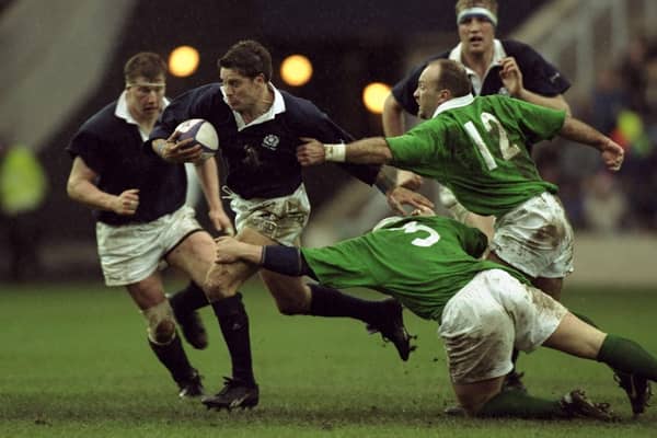 Scotland's Alan Tait getting past Ireland's Paul Wallace and Kurt McQuilkin during a 38-10 Five Nations victory for the hosts at Edinburgh's Murrayfield Stadium in March 1997 (Pic: Andrew Redington/Allsport/Getty Images)