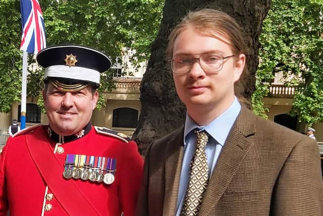 Rupert, right, with a sergeant of the Coldstream Guards at the parade.