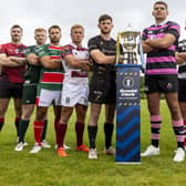 Hawick’s Fraser Renwick, second from left; Kelso’s Dwain Patterson, five to his right; and Melrose’s Angus Runciman, another two to the right, meet representatives of the seven other clubs they’ll be up against once the new Arnold Clark Premiership rugby season starts on Saturday (Photo: Craig Williamson/SNS Group/SRU)