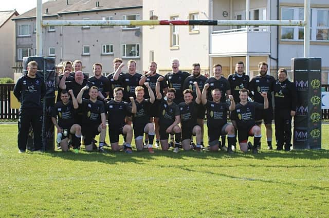 Berwick Rugby Club's jubilant squad celebrate winning promotion at the end of last season
