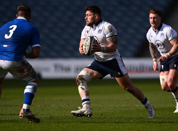Rory Sutherland and, right, Stuart Hogg in action during the Guinness Six Nations match between Scotland and Italy at Murrayfield on March 20 in Edinburgh (Photo by Stu Forster/Getty Images)
