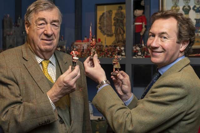 Gerald and Edward Maitland-Carew with some of the toy soldiers on display.