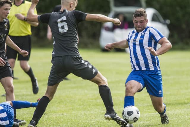Craig Cowan on the ball for Jed Legion against Berwick Colts at the weekend (Photo: Bill McBurnie)