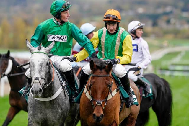 Ryan Mania, right, on Midnight Shadow after winning the Paddy Power Gold Cup Handicap Chase at Cheltenham Racecourse yesterday (Photo by Alan Crowhurst/Getty Images)