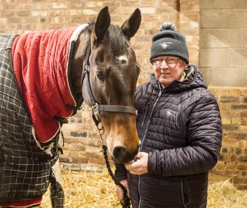 Hawick racehorse trainer Donald Whillans with another of his horses, Stolen Money, also a winner at Ayr (Pic: Bill McBurnie)