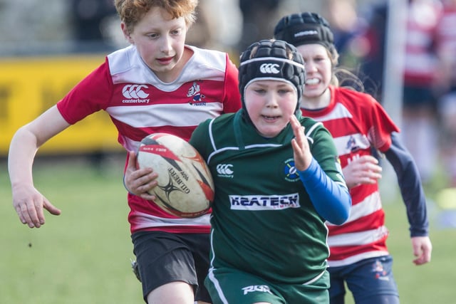 Hawick's Cullen Sutherland making a break at the Kelso tournament with opposition players in pursuit