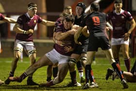 A charge by Gala's Tim McKavanagh being halted by Biggar at Netherdale in Galashiels on Friday night (Photo: Alwyn Johnston)