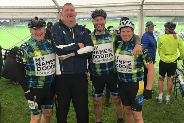 Craig Chalmers, far right, with Doddie Weir, secoond from left, and Michael Goldie, far left, and Alan Walsh in Melrose in 2019