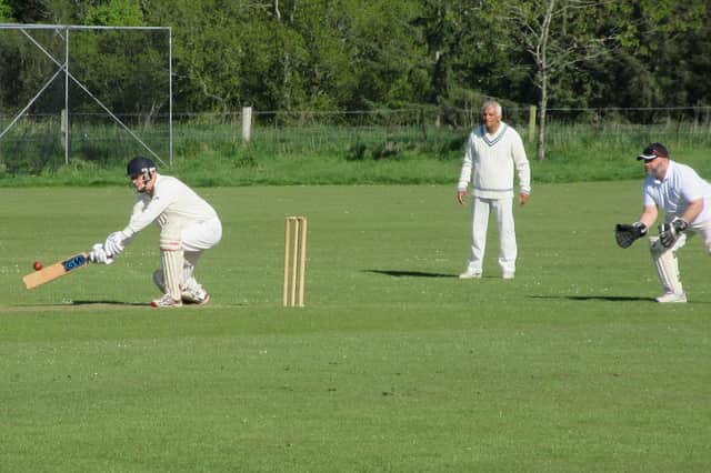 Manderston skipper Richard Thomson sweeps (picture by Ed Richards)