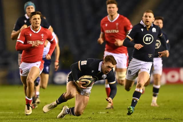 Stuart Hogg slips during the Guinness Six Nations match between Scotland and Wales at Murrayfield on February 13, 2021, in Edinburgh. (Photo by Stu Forster/Getty Images)