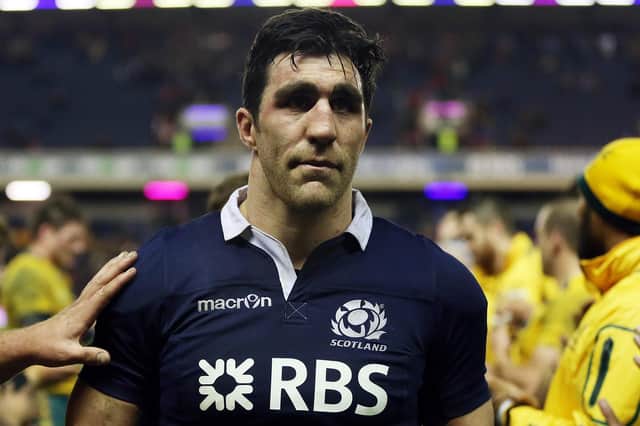 Scotland's Kelly Brown leading his team off the pitch after losing 21-15 to Australia at Edinburgh's Murrayfield Stadium on November 23, 2013. (Photo: Ian MacNicol/AFP via Getty Images)