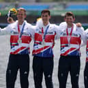 Harry Leask, left, with fellow crewmen Jack Beaumont, Tom Barras and Angus Groom celebrates the silver medal win in Tokyo (picture by Naomi Baker/Getty Images)