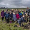 Bryce MacDougall and Matthew Nesbit from Lauder Primary School the Duke of Gloucester to plant the final tree in the town’s new Platinum Jubilee Wood, watched by classmates. Photo: Phil Wilkinson.