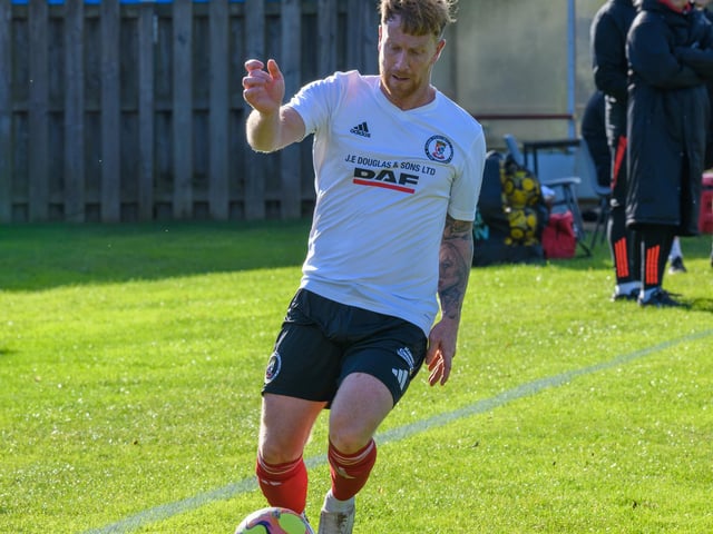 Mark Weatherburn in action for Duns Amateurs as they beat Hawick United 9-1 at home in round one of this football season’s Waddell Cup on Saturday (Photo: Alan Raeburn)
