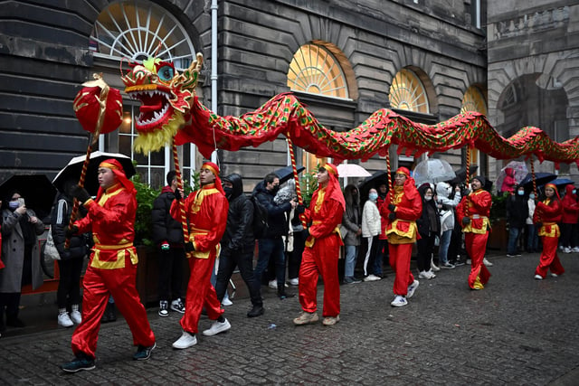 The parade wove through the streets of Edinburgh before making its way to Edinburgh Castle for an impressive light display.