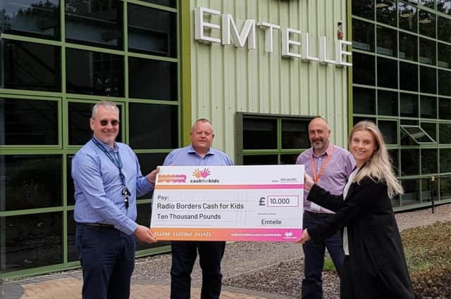 From left are: Emtelle’s Billy Rae, Tony Rodgers and Colin Kirkpatrick, with Cash for Kids charity manager Alice Edwards.