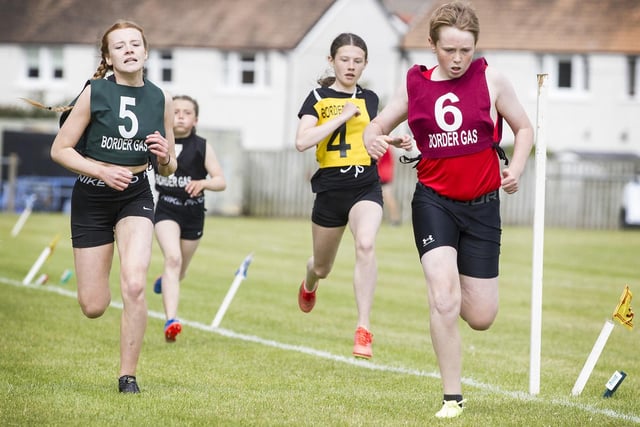 Kelso's Lewis Fleming, No 6, winning a heat for the youths' 200m open at Kelso Border Games