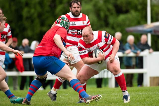Matt Carryer on the ball during Sunday's Scottish inter-district championship final between South of Scotland and Caledonia Reds at Braidholm in Glasgow (Photo: Euan Cherry/SNS Group/SRU)