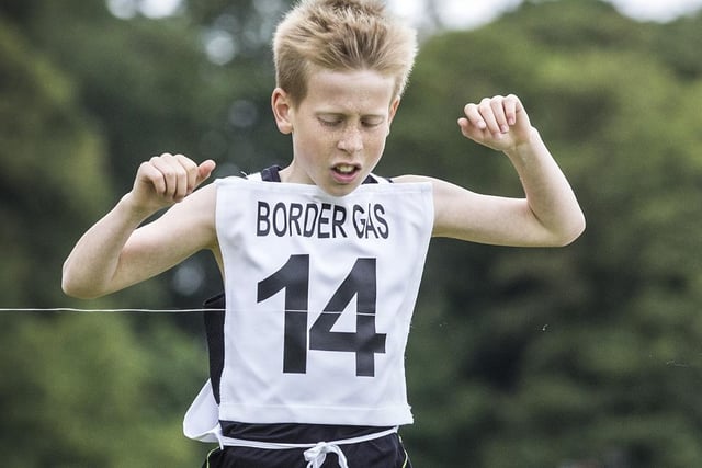 Hawick's McLaren Welsh winning the 800m youth race at Kelso Border Games