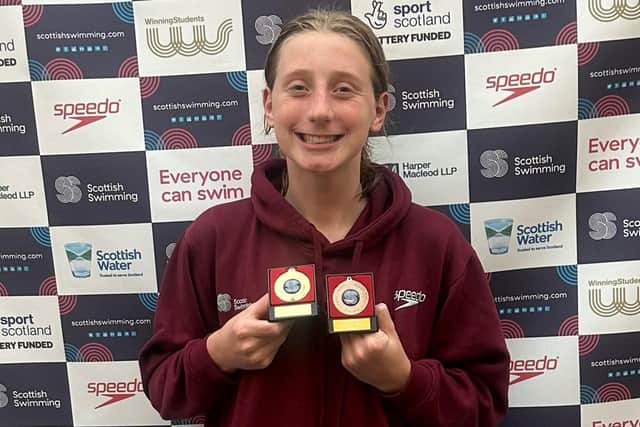 Lili Mundell with swimming medals