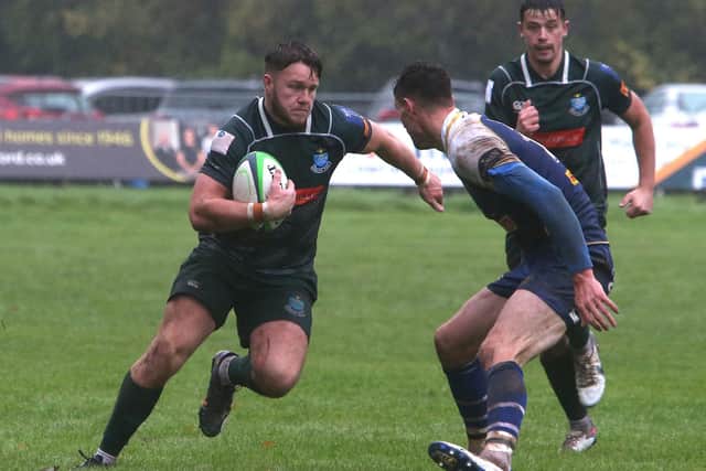 Andrew Mitchell on the ball for Hawick, supported by Kirk Ford, during their 61-0 win at Jed-Forest on Saturday (Photo: Steve Cox)