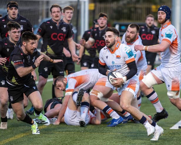 Gregor McNeish looking to halt a run by Charlie Shiel during Southern Knights 54-19 loss at home to Edinburgh A at Melrose's Greenyards on Friday (Photo: Craig Murray)