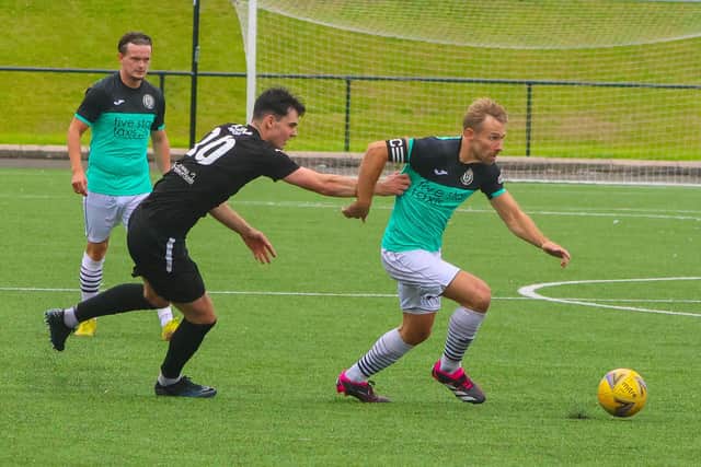 Gala Fairydean Rovers skipper Danny Galbraith tries to make headway against Bo’ness United (Pics by Scott Louden)