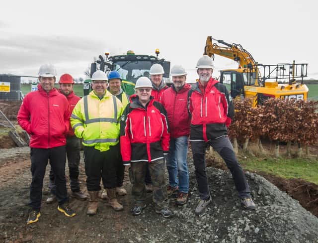 At the site of the new Mountain Rescue station in Kelso, main contractor Matthew Lee, with team members, David Williams, architect technician; David Barnes, vehicle officer;  Carl Outhwaite;, Kevin Sterrick, treasurer; Duncan Buchanan, team leader; Bob McKead, base officer and Brian Tyson, chairman. (Photo: BILL McBURNIE)