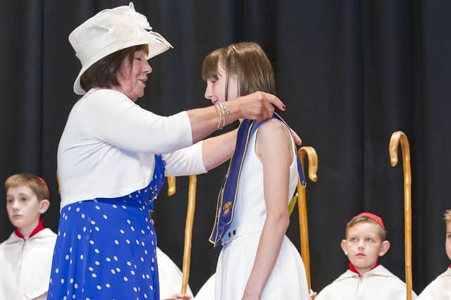 Dux girl Ruby Finn gets presented with her sash in 2015. Photo: Ian Linton.